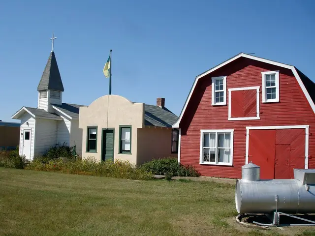 Museum buildings: church, stucco building and red barn